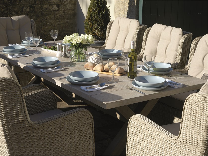 Chedworth Sandstone Ceramic Rectangle Table with 8 Rattan Armchairs Alternative Image