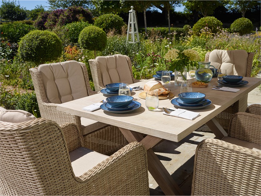 Chedworth Sandstone Ceramic Rectangle Dining Set with 6 Rattan Armchairs Alternative Image