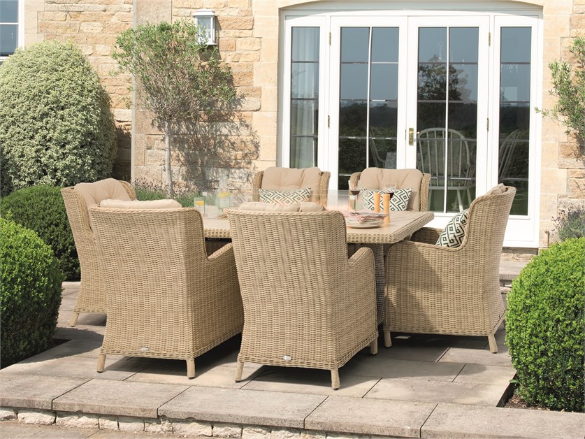 Chedworth Sandstone Rattan Rectangle Dining Firepit Table Set with 6 Armchairs