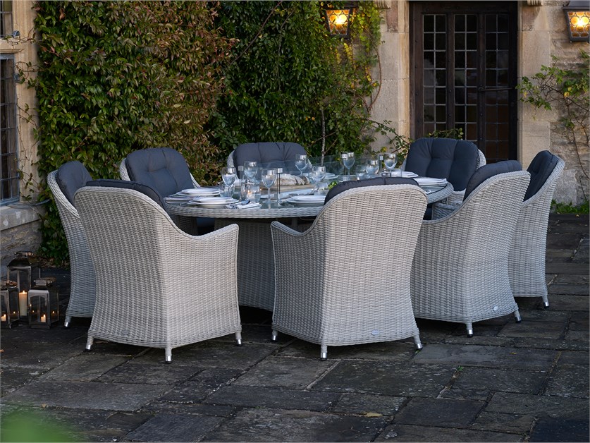 Monterey Dove Grey Rattan Elliptical Firepit Dining Table with 8 Armchairs